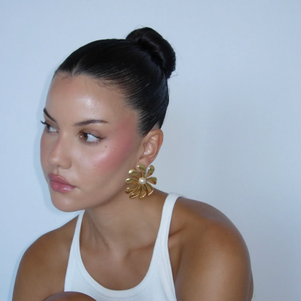 oversized flower earrings in gold