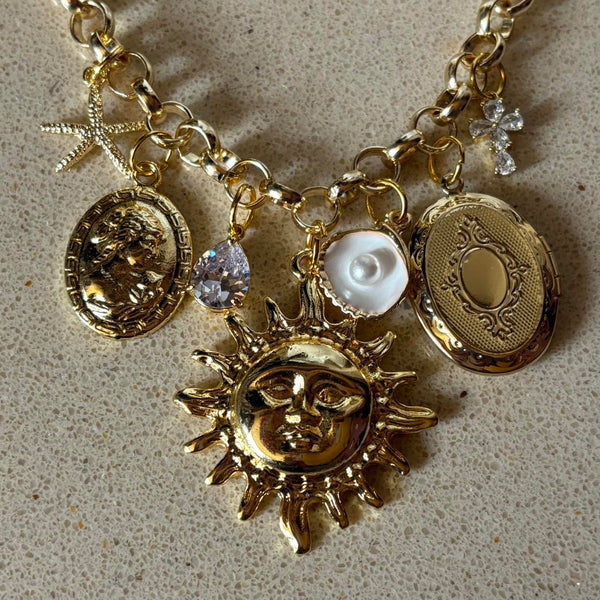 oversized gold sun charm necklace