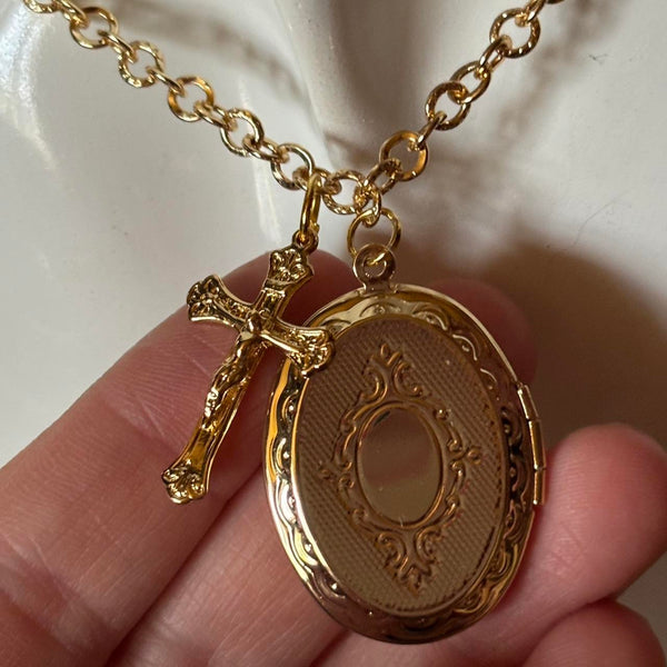 oval locket and cross charm necklace