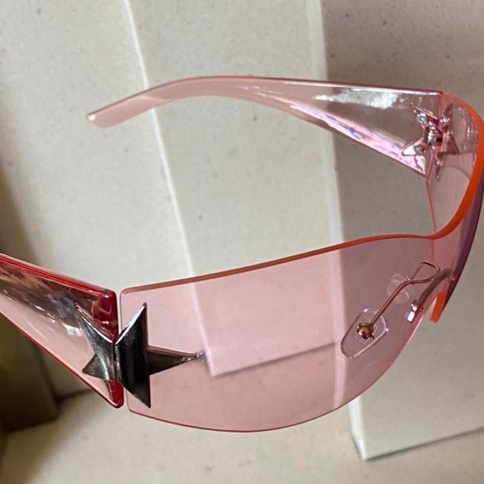 pink sporty wrap around sporty sunglasses