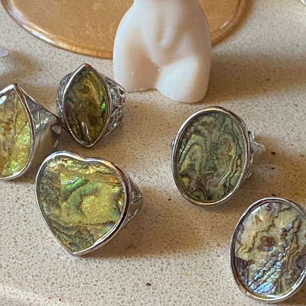 oval shiny shell stone ring