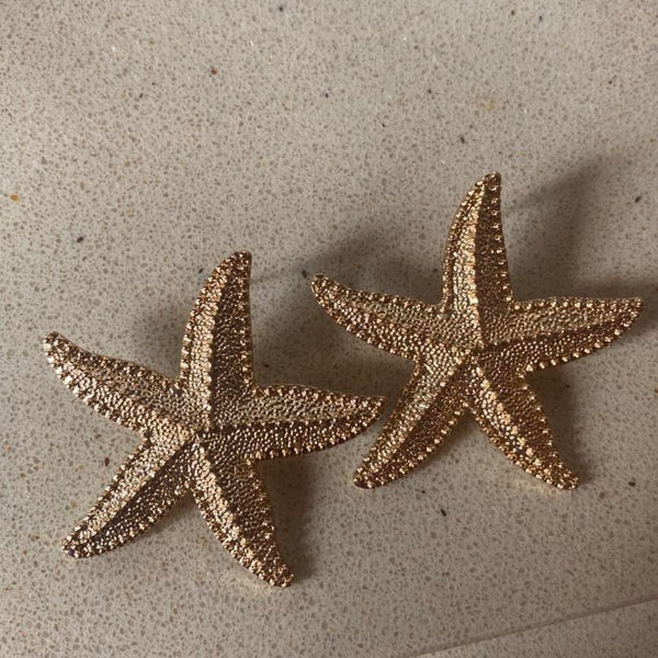 oversized gold starfish earrings