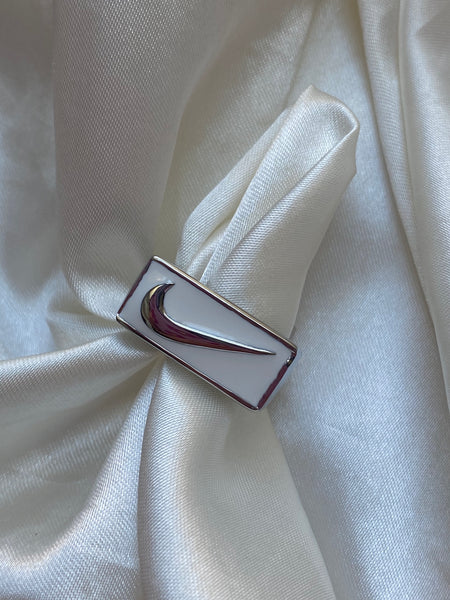 White swoosh ring