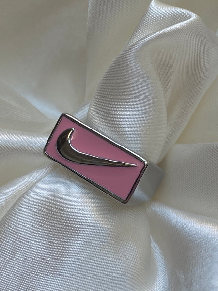 Pink swoosh ring