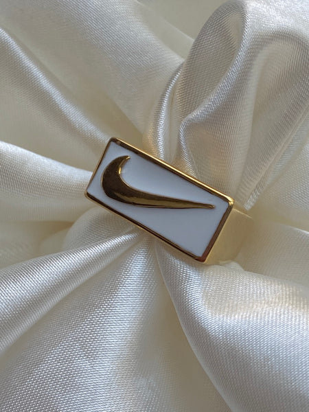 White swoosh ring